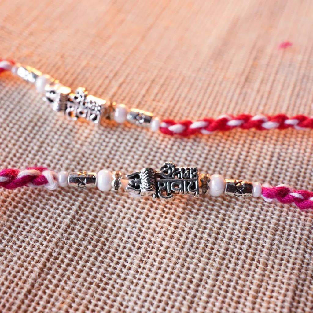 Om Namah Shivay artificial silver Rakhi